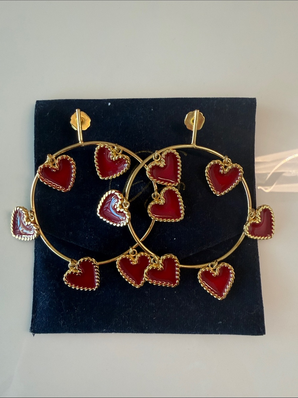 Gold Hoop Earrings with Red Heart Charms by